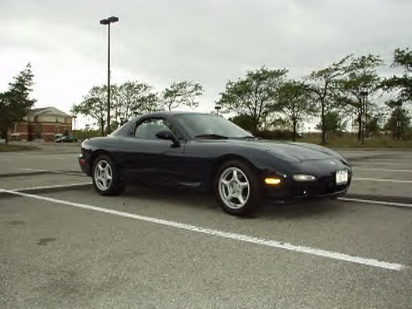 http://i61.photobucket.com/albums/h42/RedDawg55/Car%20club%20pics/1st%20UBRF%20meet%209-22-01%20Hoch%20lot/rx7.jpg