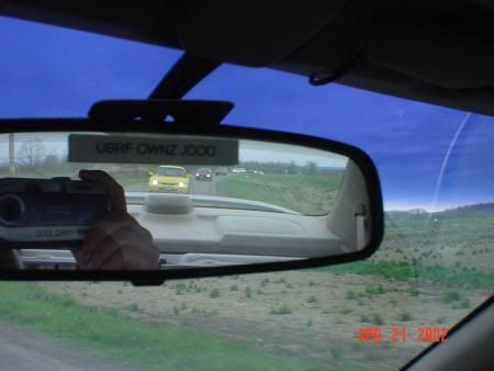 http://i61.photobucket.com/albums/h42/RedDawg55/Car%20club%20pics/4-21-02%20Track%20Day/ianrearview.jpg