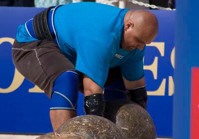 Laurence Shahlaei lifts an atlas stone