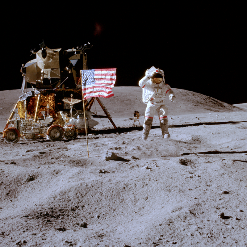 Apollo 16 Flag Salute, John Young captured saluting the flag while jumping! A great demonstration of the lower gravity on the Moon. Apollo 16 Lunar Module (LM) Orion and the Lunar Roving Vehicle (LRV) are in the background [NASA/Charlie Duke].