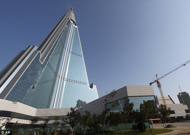 North Korea's Ryugyong Hotel, After 25 long years of being left to languish unfinished, it continues to be a deeply strange blot on the skyline of North Korea, and has reportedly even been airbrushed out of official shots by an embarrassed regime, The Daily Telegraph reported. It has become an object of scorn for the rest of the world, with Esquire magazine branding it the 'worst building in the history of mankind' in 2008.