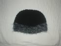 Hat on the bed!  Toddler/Pre-school Furry Trimmed Black Hat