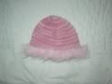 Hats on the bed!  Newborn/Infant Fuzzy Pink Hat