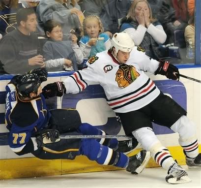 Jay McKee and Brent Seabrook collide. Heart attack ensues.