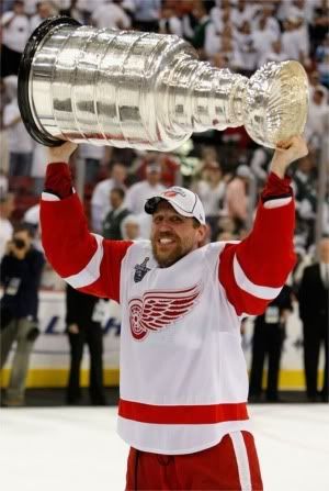 Dallas Drake lifting the cup. 