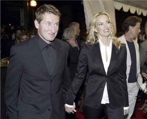 Gretzky and his wife betting on having a good time on the red carpet.