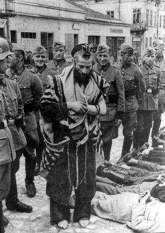 One of the most famous images of the holocaust is of Rabbi Moshe Hagerman the Dayan - Jewish municipal chief judge, dressed in his Talit and Teffilin and being abused by German soldiers