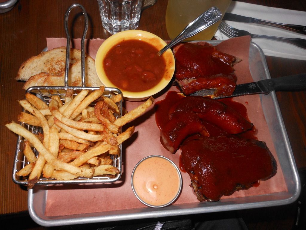  Meat-a-Poloza at Russell St. BBQ with smoked sausage, marbled brisket, baby back ribs, bean, fries, and Texas toast