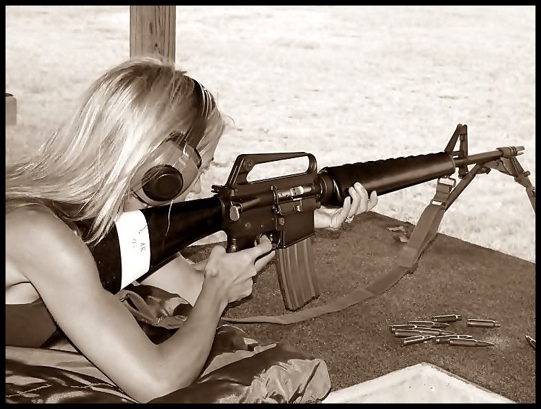 Pictures from the range... my wife shooting the Colt Model 606 replica ...