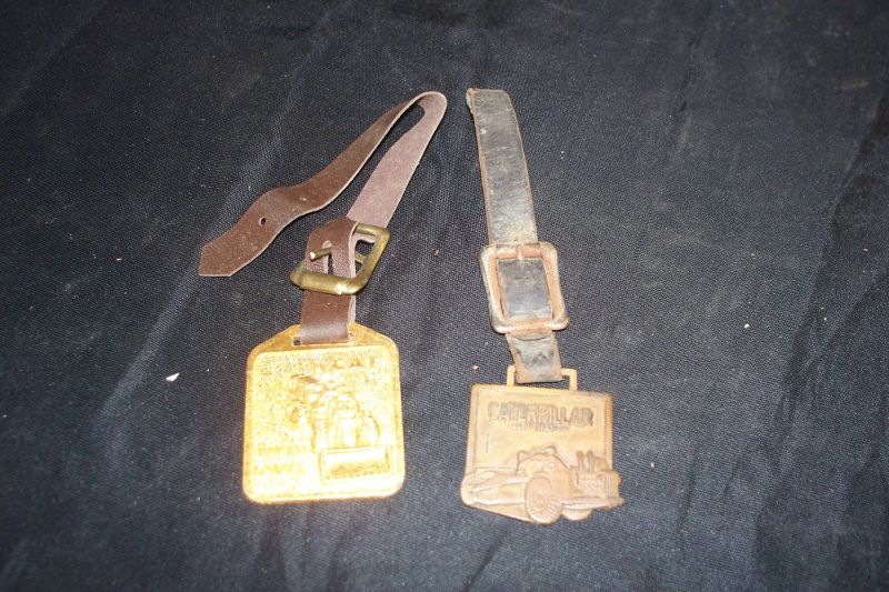 Pair Vintage Caterpillar Watch Fobs   1 Wheel Loader  